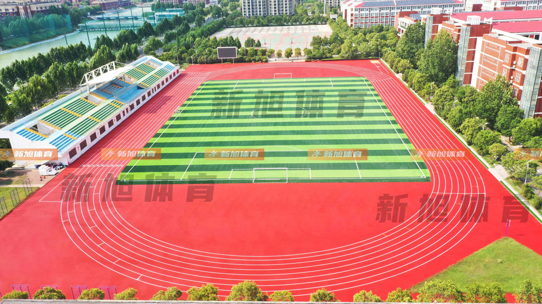 新旭体育新郑一中学校混合型塑胶跑道建设施工完工
